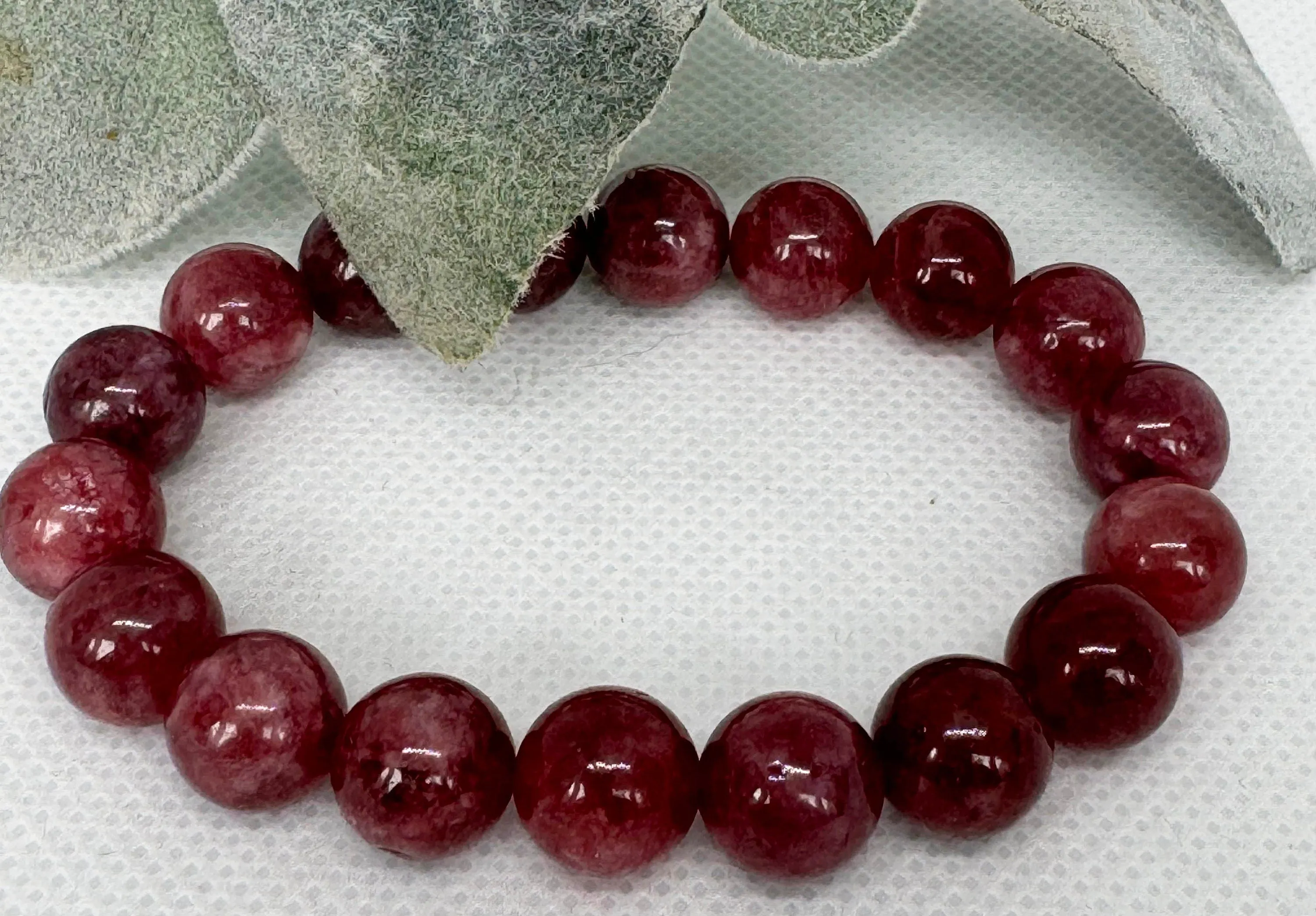 Garnet 10mm stretch beaded bracelet with a spacer. Gift for him, gift for her. January Birthday Stone. Passion, Energy, Revitalization.