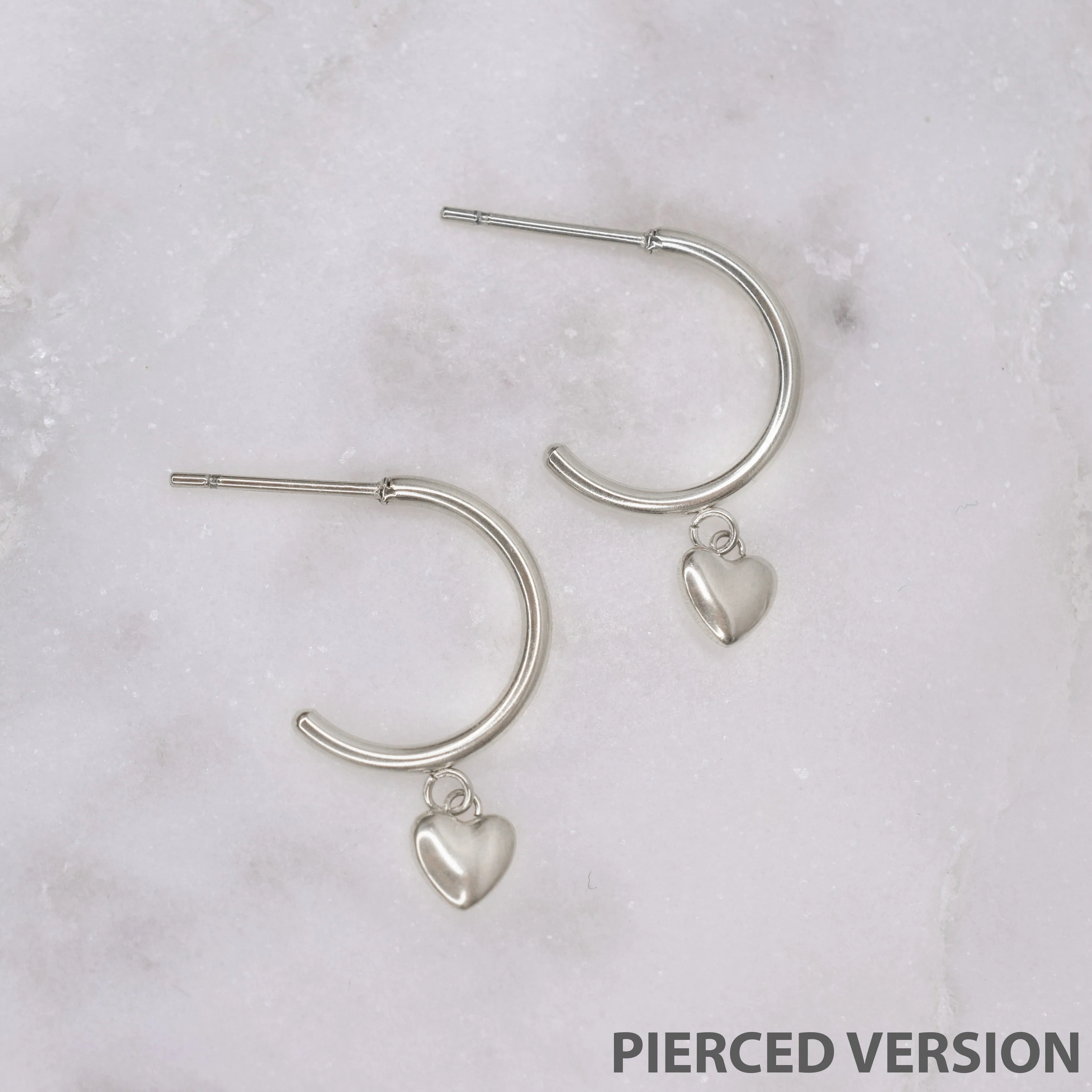 MINI HEART HUGGIE HOOP EARRINGS IN SILVER