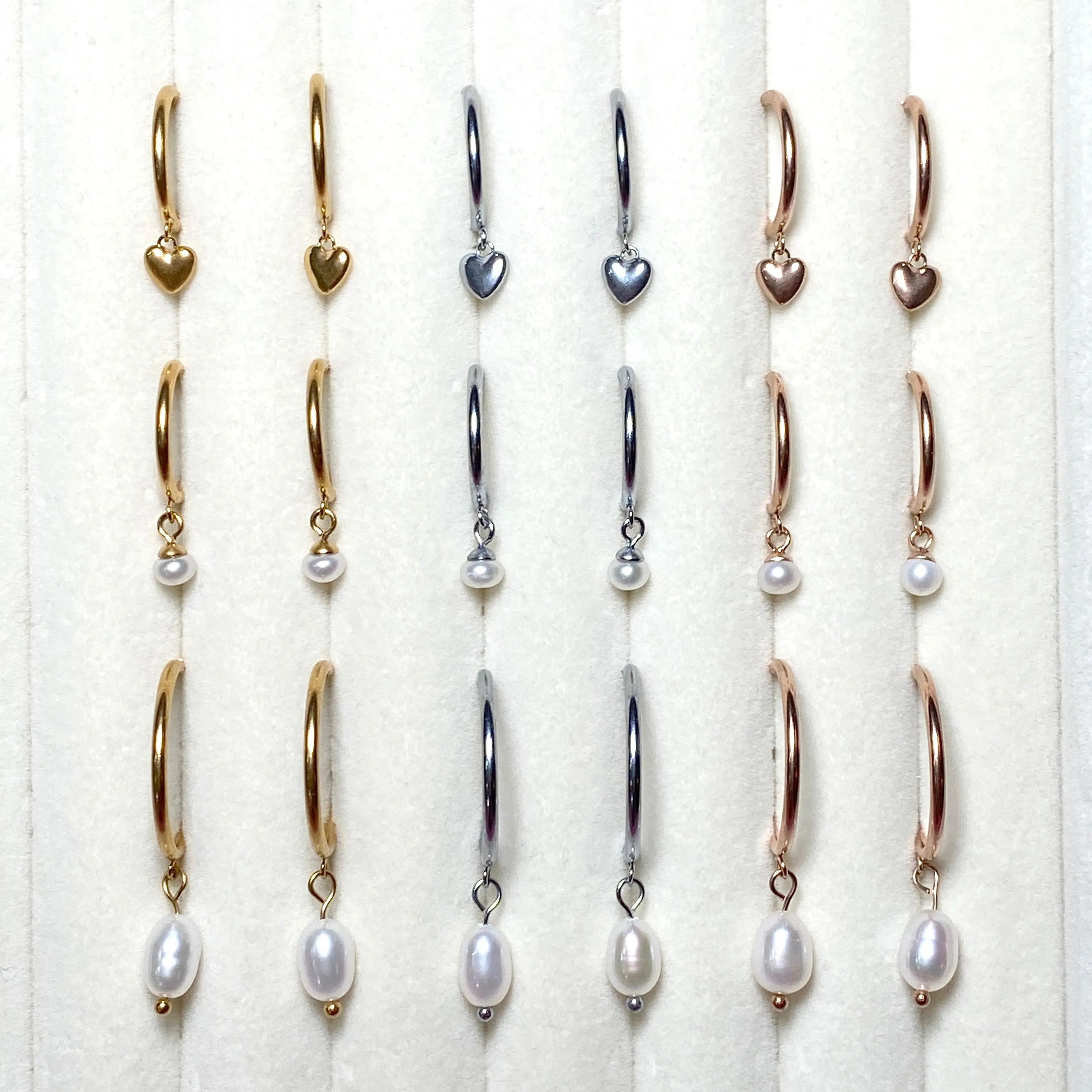 MINI HEART HUGGIE HOOP EARRINGS IN SILVER