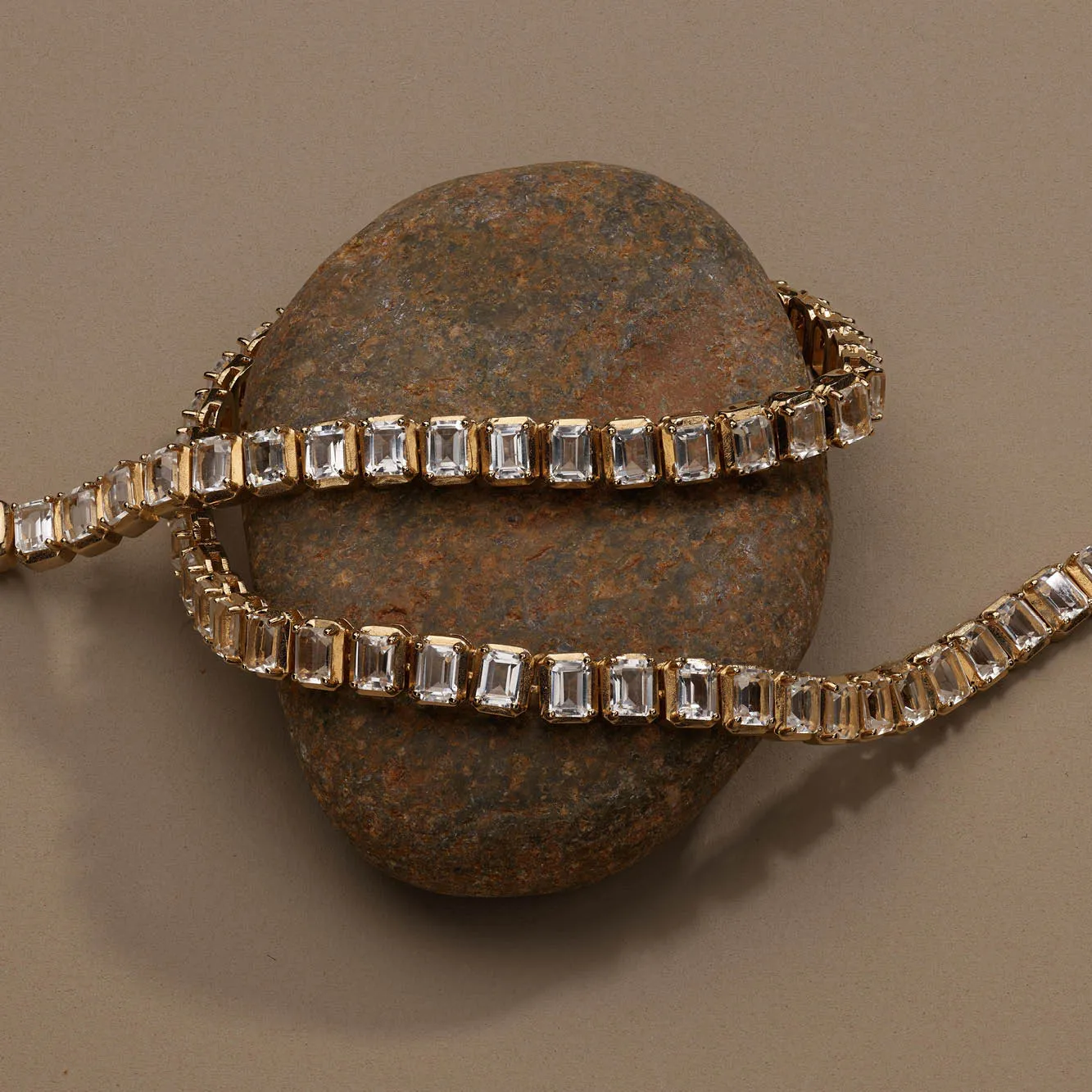 White Topaz Emerald Cut Tennis Bracelet in Gold